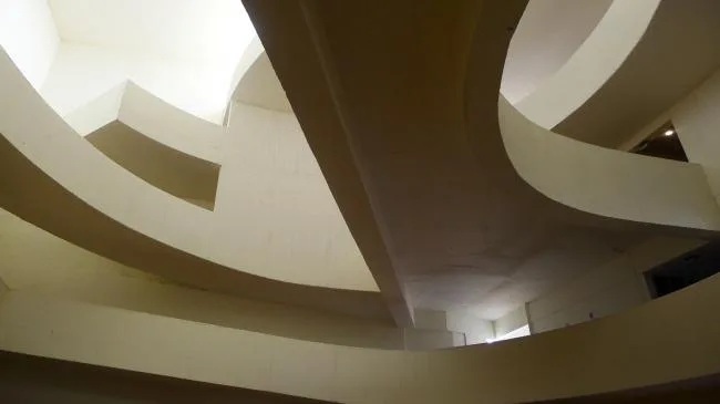 BIM Architecture | The winding ramps interweave and weave through the ever-changing spaces/Santo Tomas Academy
