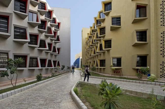 BIM Architecture | Diverse and Colorful, Each Window Has Its Own Personality in Student Apartment Buildings/Sanjay Puri Architecture Firm