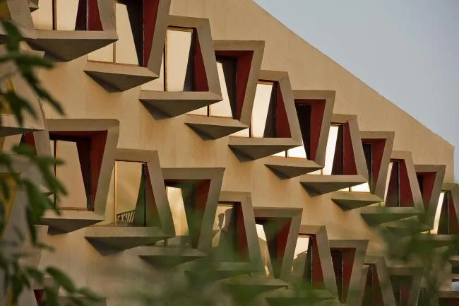 BIM Architecture | Diverse and Colorful, Each Window Has Its Own Personality in Student Apartment Buildings/Sanjay Puri Architecture Firm