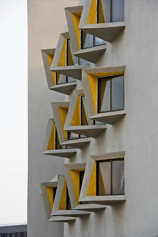 BIM Architecture | Diverse and Colorful, Each Window Has Its Own Personality in Student Apartment Buildings/Sanjay Puri Architecture Firm