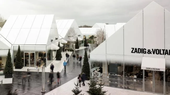 BIM Architecture | Lyon Outlets in France, white chambers form villages/Gianni Ranaulo Design