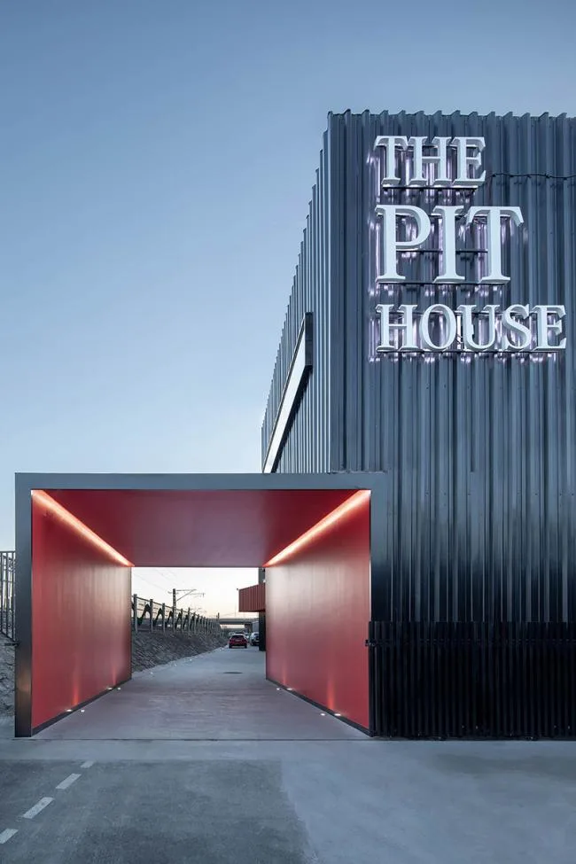 BIM Architecture | A Social Experiment for Car Enthusiasts, The Pit House Car Club/Building Up and Building Down Studio