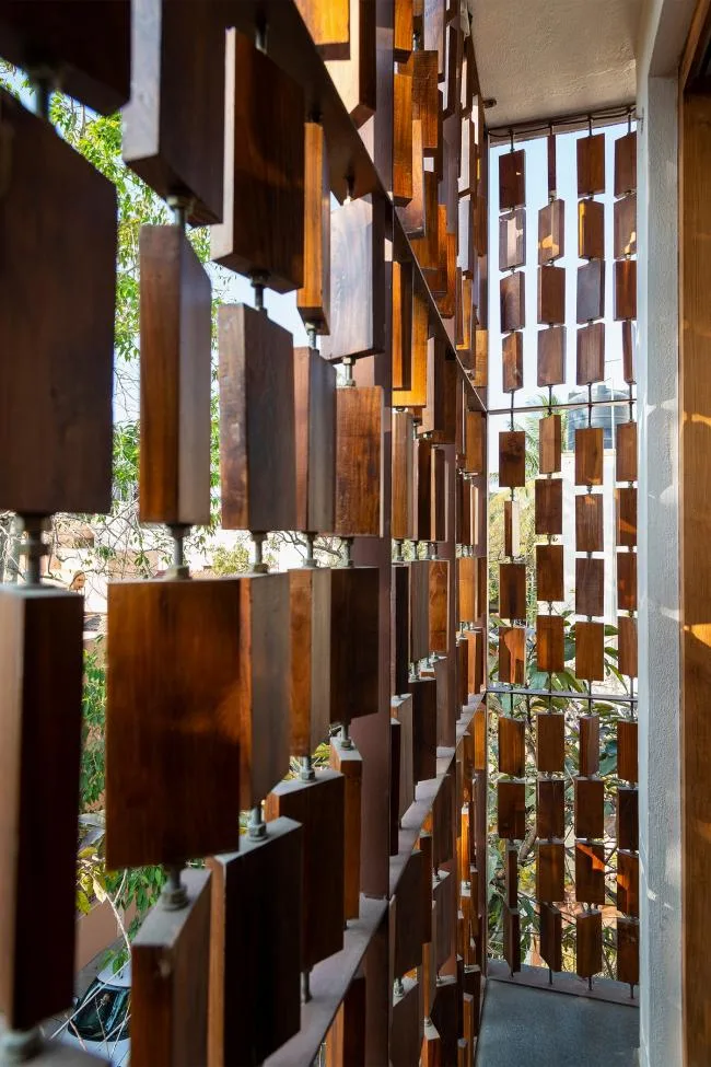 BIM architecture | Indian independent studio/studioXS with facade grille and wooden board resembling an abacus