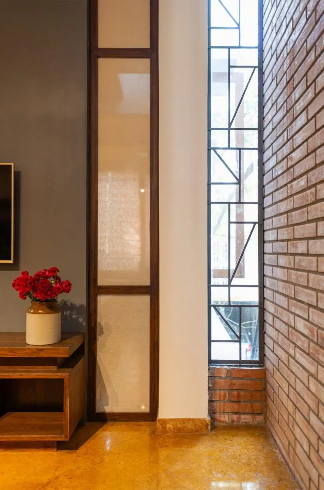 BIM architecture | Indian independent studio/studioXS with facade grille and wooden board resembling an abacus