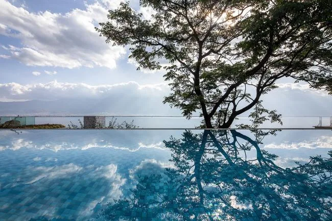 BIM Architecture | Sunset Glow Over Cang'er Lake: Notes on the Construction of the Slow House in Dali/IDO Yuanxiang Architecture+Chongqing Hexin Architectural Design Institute