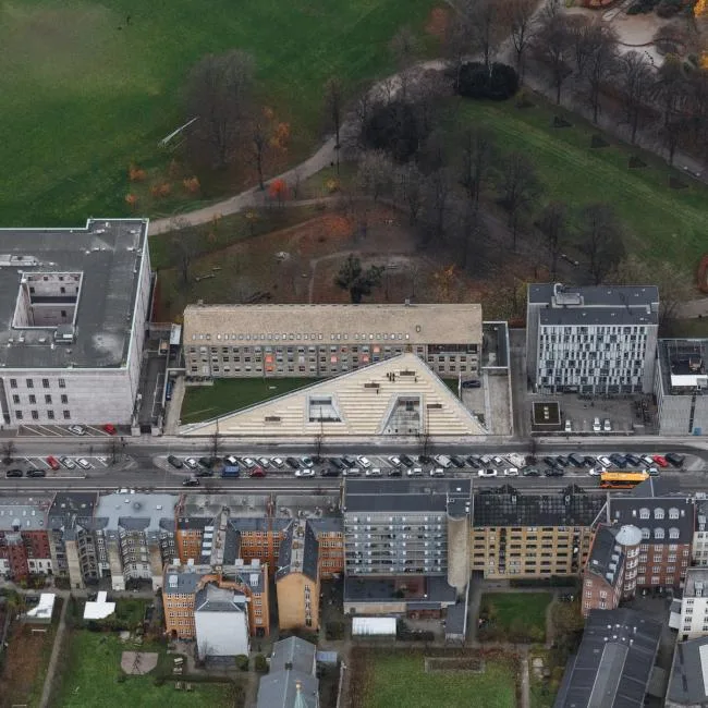 BIM Architecture | Developed on the Ground, Tilted Upward: Danish Red Cross Volunteer Home/COBE
