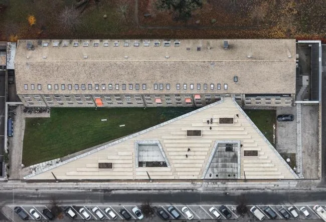 BIM Architecture | Developed on the Ground, Tilted Upward: Danish Red Cross Volunteer Home/COBE