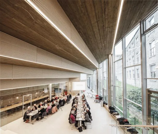BIM Architecture | Developed on the Ground, Tilted Upward: Danish Red Cross Volunteer Home/COBE