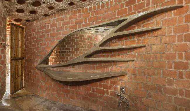 BIM Architecture | Flying Curves Reflected in the Village Skyline: Indian Red Brick House/iStudio Architecture