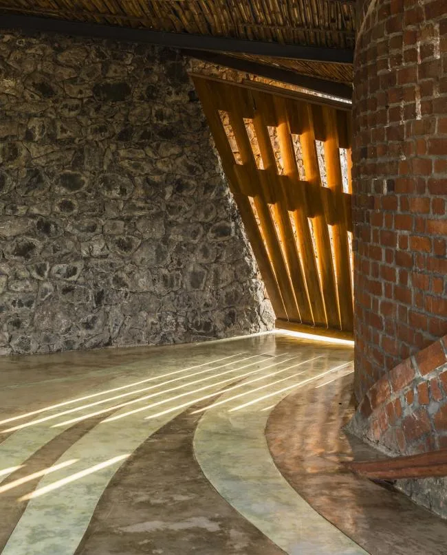 BIM Architecture | Flying Curves Reflected in the Village Skyline: Indian Red Brick House/iStudio Architecture