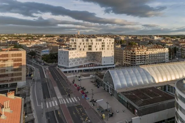 BIM Architecture | Elegant and Holy Like a Pure White Lace Skirt: Montigny Hotel Complex/Manuelle Gautrand Architecture