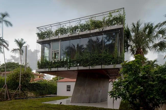 BIM Architecture | Geometric Freehand Concrete Sculpture: Solar Trajectory Residence/Christian Wassmann
