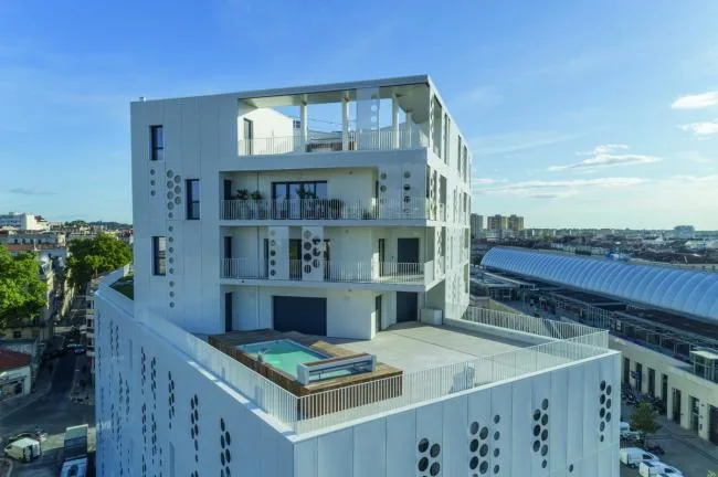 BIM Architecture | Elegant and Holy Like a Pure White Lace Skirt: Montigny Hotel Complex/Manuelle Gautrand Architecture