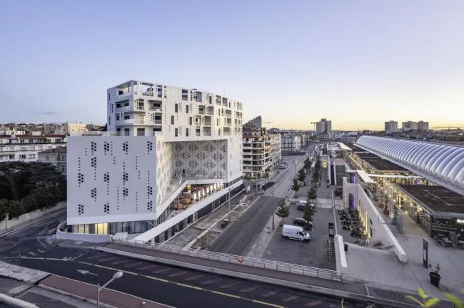 BIM Architecture | Elegant and Holy Like a Pure White Lace Skirt: Montigny Hotel Complex/Manuelle Gautrand Architecture