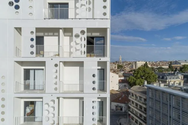 BIM Architecture | Elegant and Holy Like a Pure White Lace Skirt: Montigny Hotel Complex/Manuelle Gautrand Architecture