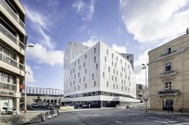 BIM Architecture | Elegant and Holy Like a Pure White Lace Skirt: Montigny Hotel Complex/Manuelle Gautrand Architecture
