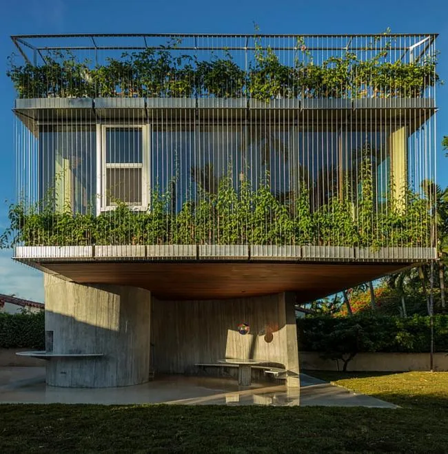 BIM Architecture | Geometric Freehand Concrete Sculpture: Solar Trajectory Residence/Christian Wassmann