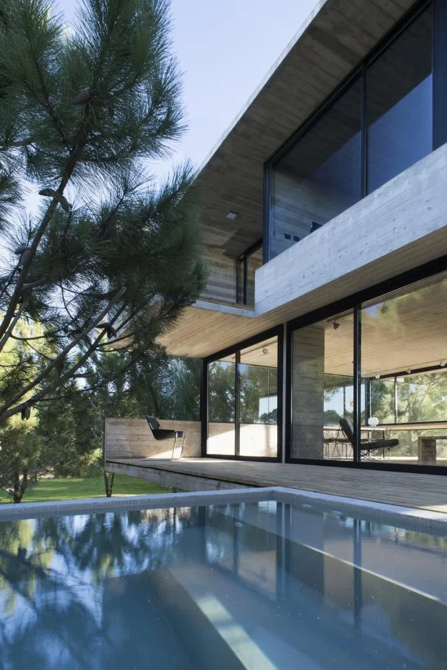 BIM Architecture | Light and Shadow Dance, Simple Forest Dwelling Like Wood and Stone/Luciano Kruk