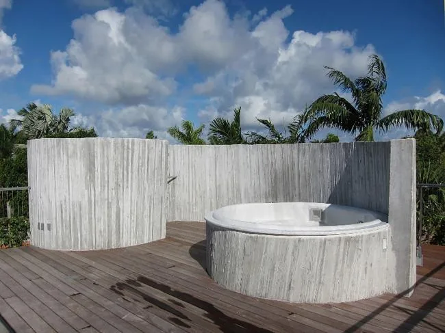 BIM Architecture | Geometric Freehand Concrete Sculpture: Solar Trajectory Residence/Christian Wassmann