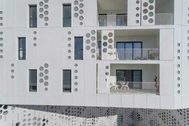 BIM Architecture | Elegant and Holy Like a Pure White Lace Skirt: Montigny Hotel Complex/Manuelle Gautrand Architecture