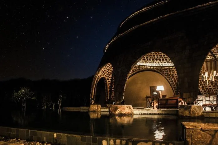 BIM Architecture | Primitive Caves Under Giant Stones on Coastal Beaches: Sri Lanka Tent Hotel/Nomadic Resorts