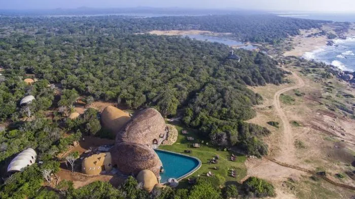 BIM Architecture | Primitive Caves Under Giant Stones on Coastal Beaches: Sri Lanka Tent Hotel/Nomadic Resorts