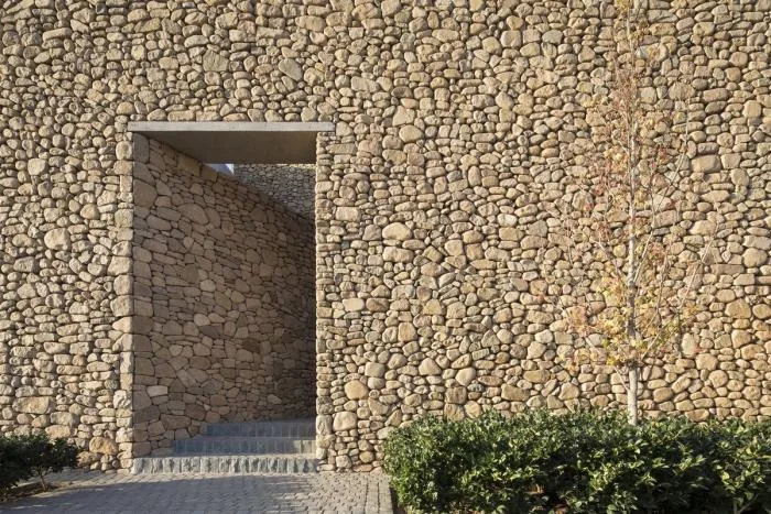 BIM Architecture | Giant Stones Embedded in the Site: Cerro la Cruz Residence/Turner Arquitectos