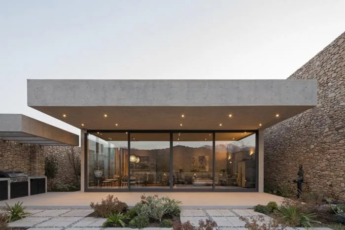 BIM Architecture | Giant Stones Embedded in the Site: Cerro la Cruz Residence/Turner Arquitectos