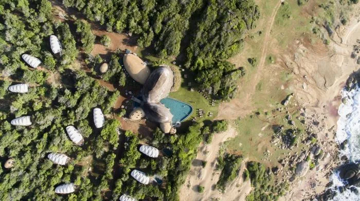 BIM Architecture | Primitive Caves Under Giant Stones on Coastal Beaches: Sri Lanka Tent Hotel/Nomadic Resorts