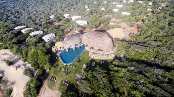 BIM Architecture | Primitive Caves Under Giant Stones on Coastal Beaches: Sri Lanka Tent Hotel/Nomadic Resorts