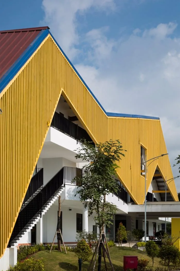 BIM Architecture | Colorful, Interlocking Hillside Kindergarten