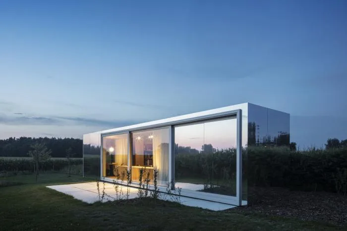 BIM Architecture | Glass Box Reflecting Green Grass and Blue Sky/TOOP
