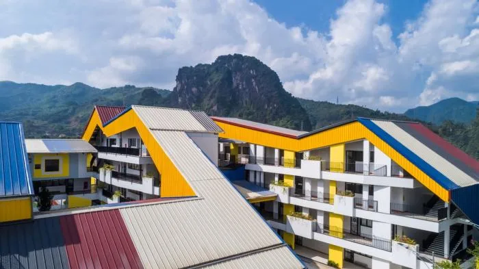BIM Architecture | Colorful, Interlocking Hillside Kindergarten