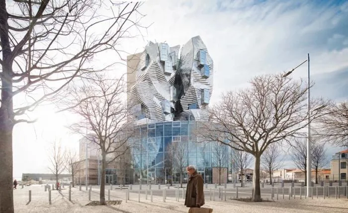 BIM Architecture | Frank Gehry's LUMA Building is nearing completion, featuring dynamic sculptures covered in silver aluminum panels