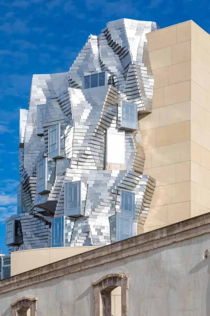 BIM Architecture | Frank Gehry's LUMA Building is nearing completion, featuring dynamic sculptures covered in silver aluminum panels