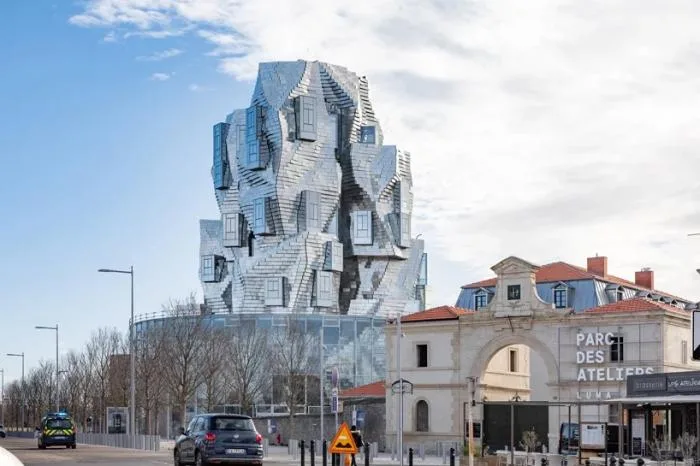 BIM Architecture | Frank Gehry's LUMA Building is nearing completion, featuring dynamic sculptures covered in silver aluminum panels