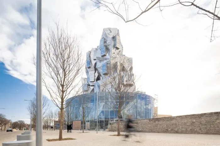 BIM Architecture | Frank Gehry's LUMA Building is nearing completion, featuring dynamic sculptures covered in silver aluminum panels