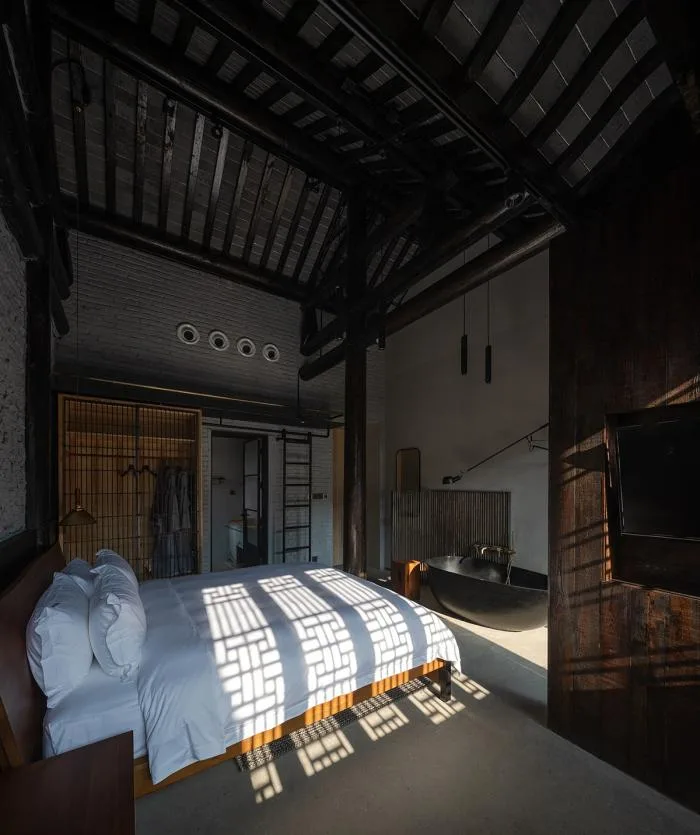 BIM architecture | Creating a modern and warm space under white walls and black tiles, Zhishe Nanchan Guanshui Hotel/Benzhe Architecture