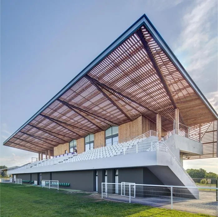 BIM Architecture | Butterflies lightly falling on the farm grass: Ger Stadium