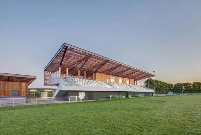 BIM Architecture | Butterflies lightly falling on the farm grass: Ger Stadium