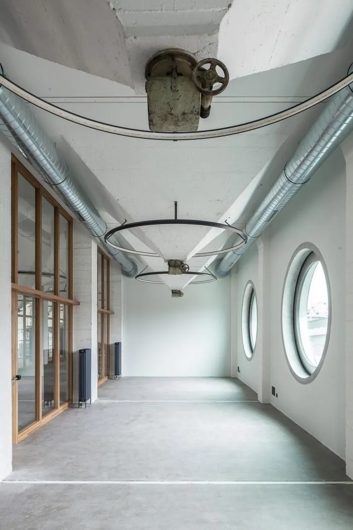 BIM architecture | Wall covered with deep 'eyes', renovation of abandoned barns