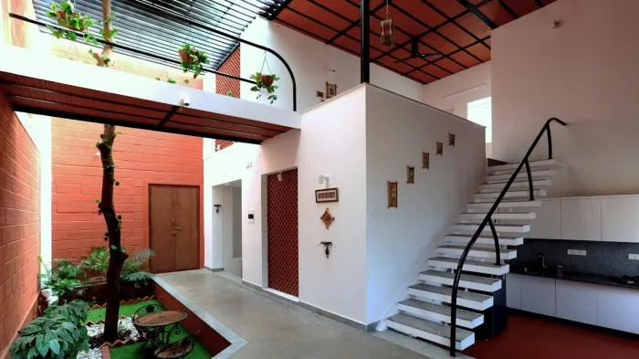 BIM architecture | solemn and transparent, elegant and natural - Indian red "treehouse"/PG Associates