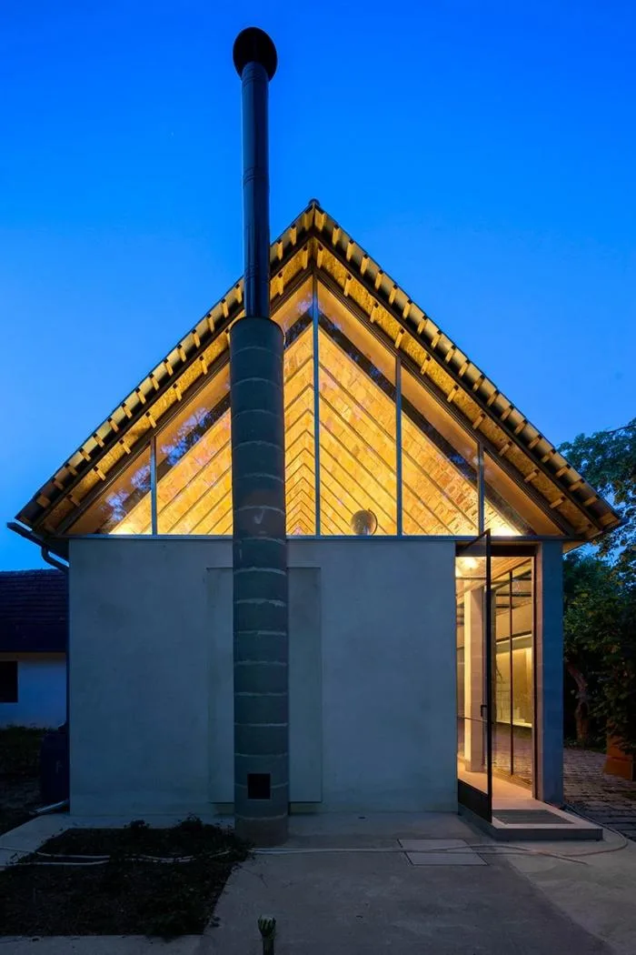 BIM architecture | Zen inspired cottage under exposed brick ceiling