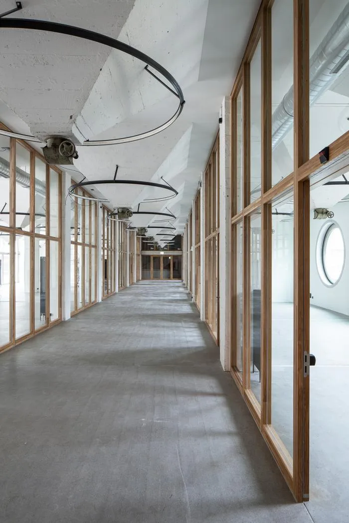 BIM architecture | Wall covered with deep 'eyes', renovation of abandoned barns