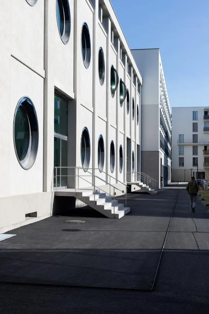 BIM architecture | Wall covered with deep 'eyes', renovation of abandoned barns
