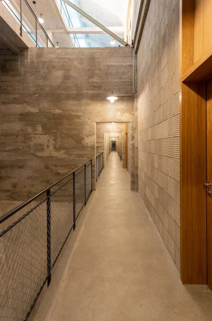 BIM architecture | Wall covered with deep 'eyes', renovation of abandoned barns