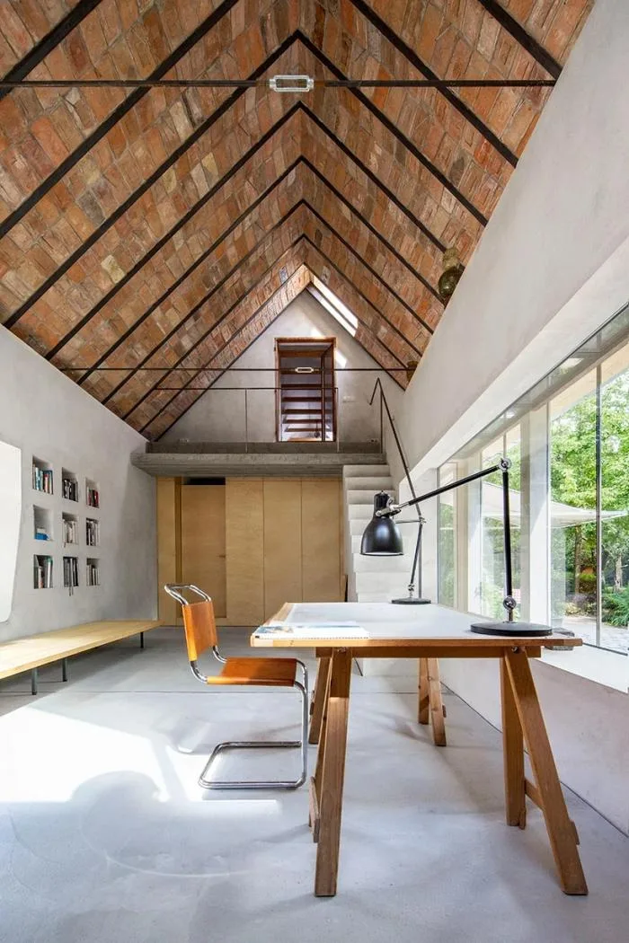 BIM architecture | Zen inspired cottage under exposed brick ceiling