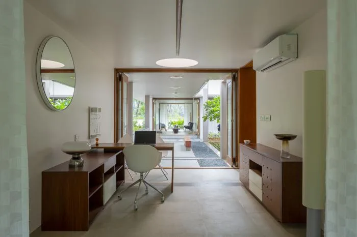 BIM Architecture | Geometric Order and Natural Landscape Quietly Blending: A Vacation Home in a Grid