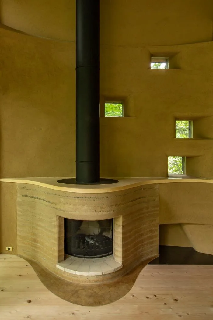 BIM architecture | Cute and playful, shell shaped earthen houses in the forest