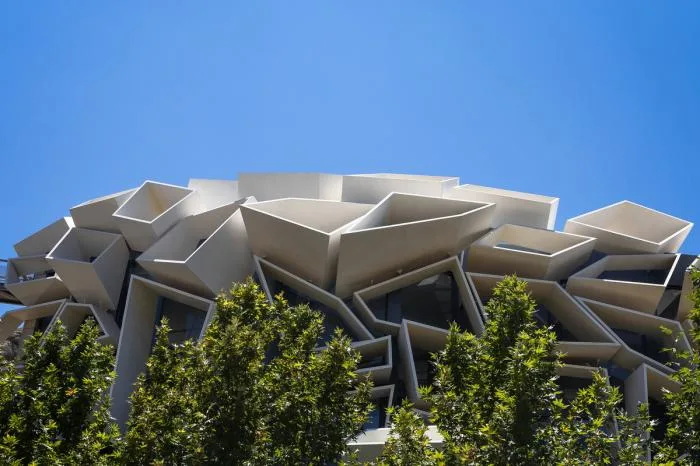 BIM architecture | Various folding panels assembled into a honeycomb like facade: Exhibition Building of Iran Greenland Convention Center